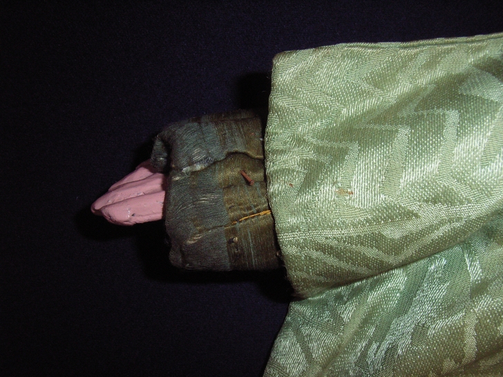 Manica prima del restauro